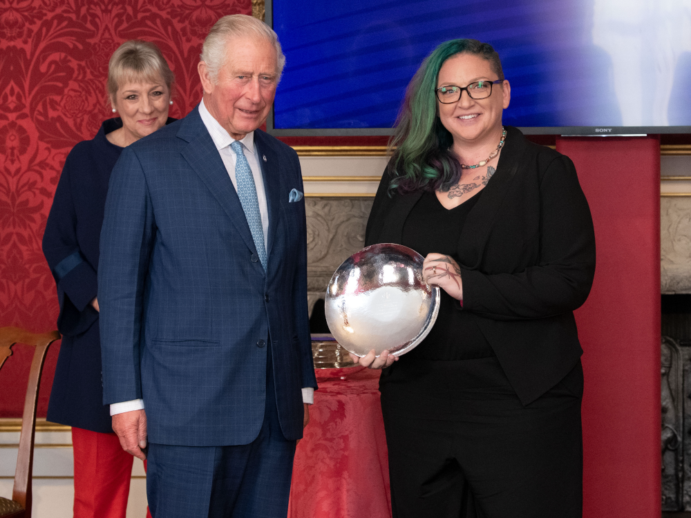 Kristin Topping is a former member of the Canadian Armed Forces and founder of rare and tropical plant company, Sweetlife Flora, based in Carleton Place, Ont., and expanding into Halifax, N.S. Here she stands with King Charles receiving an award.